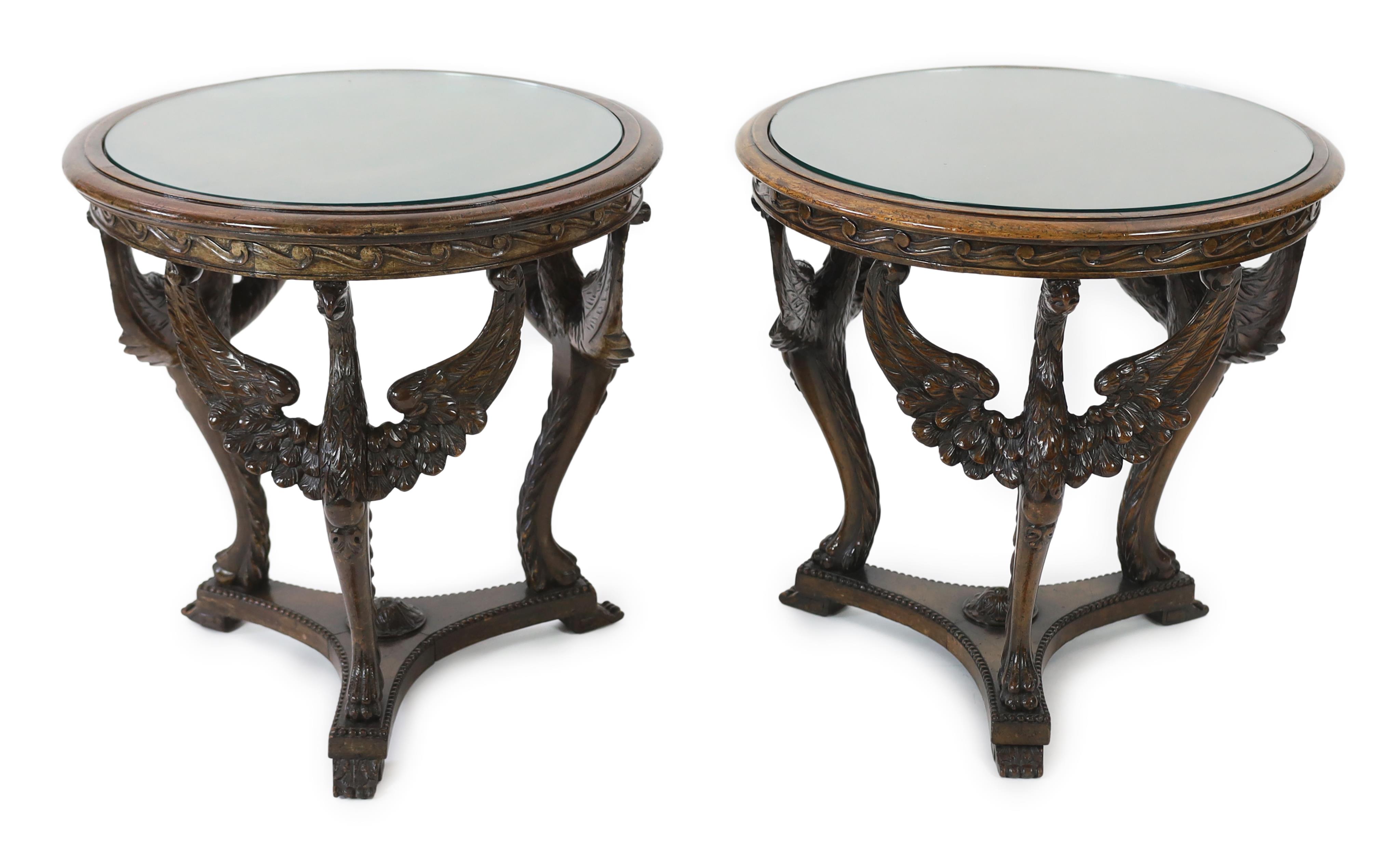 A pair of walnut occasional tables